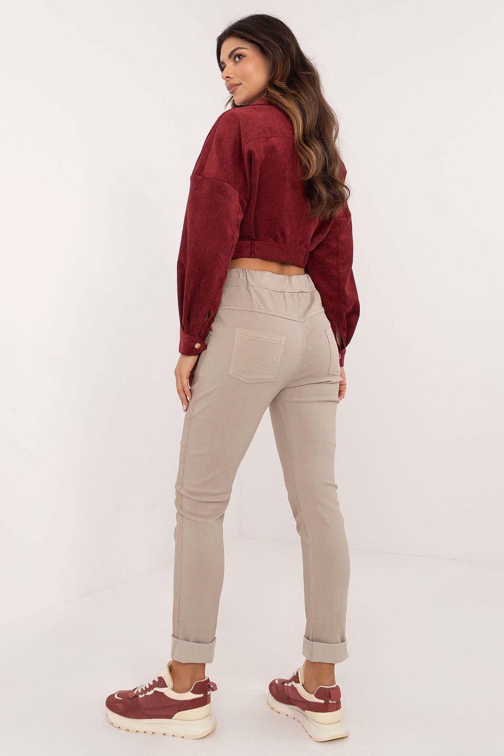 Beige women's trousers with belt loops, tapered leg and stitched seams