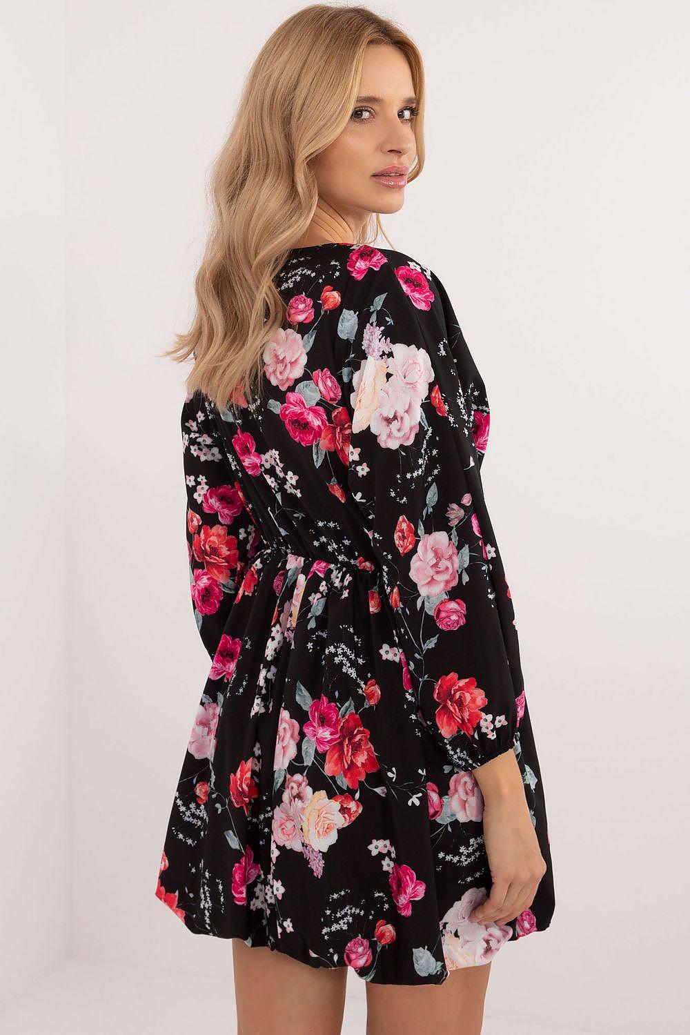 Floral daydress long sleeves, black with pink and light pink rose print, side view