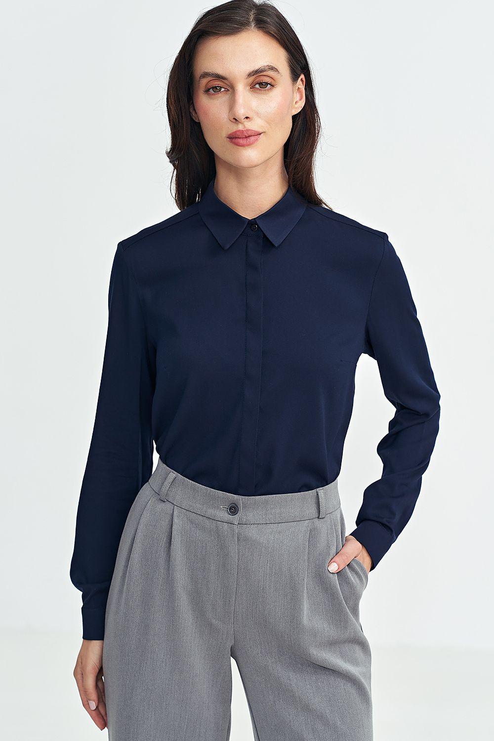 Navy blue long-sleeve button-up shirt with pointed collar and button cuffs