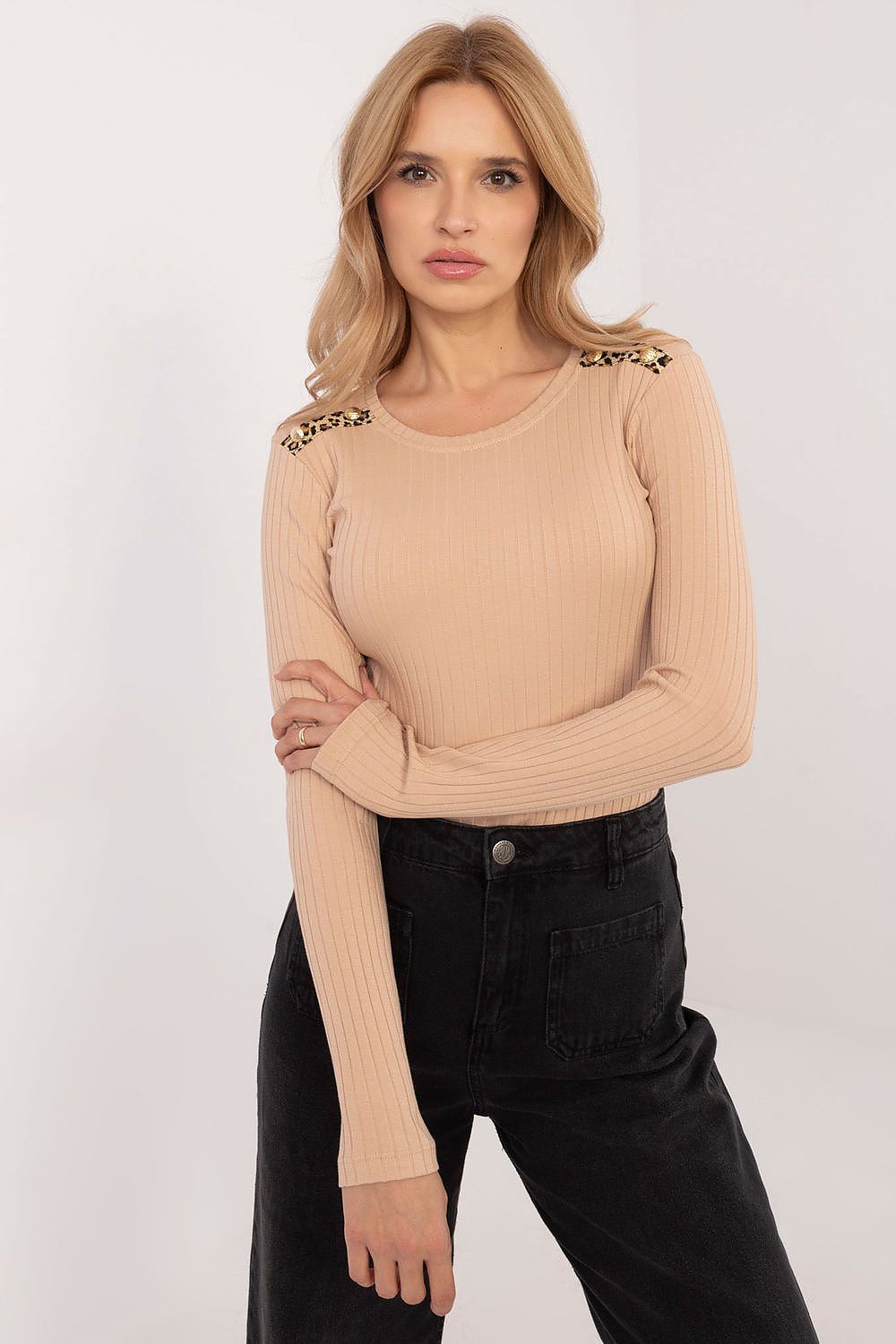 Brown ribbed blouse with animal-print shoulder detail and long sleeves