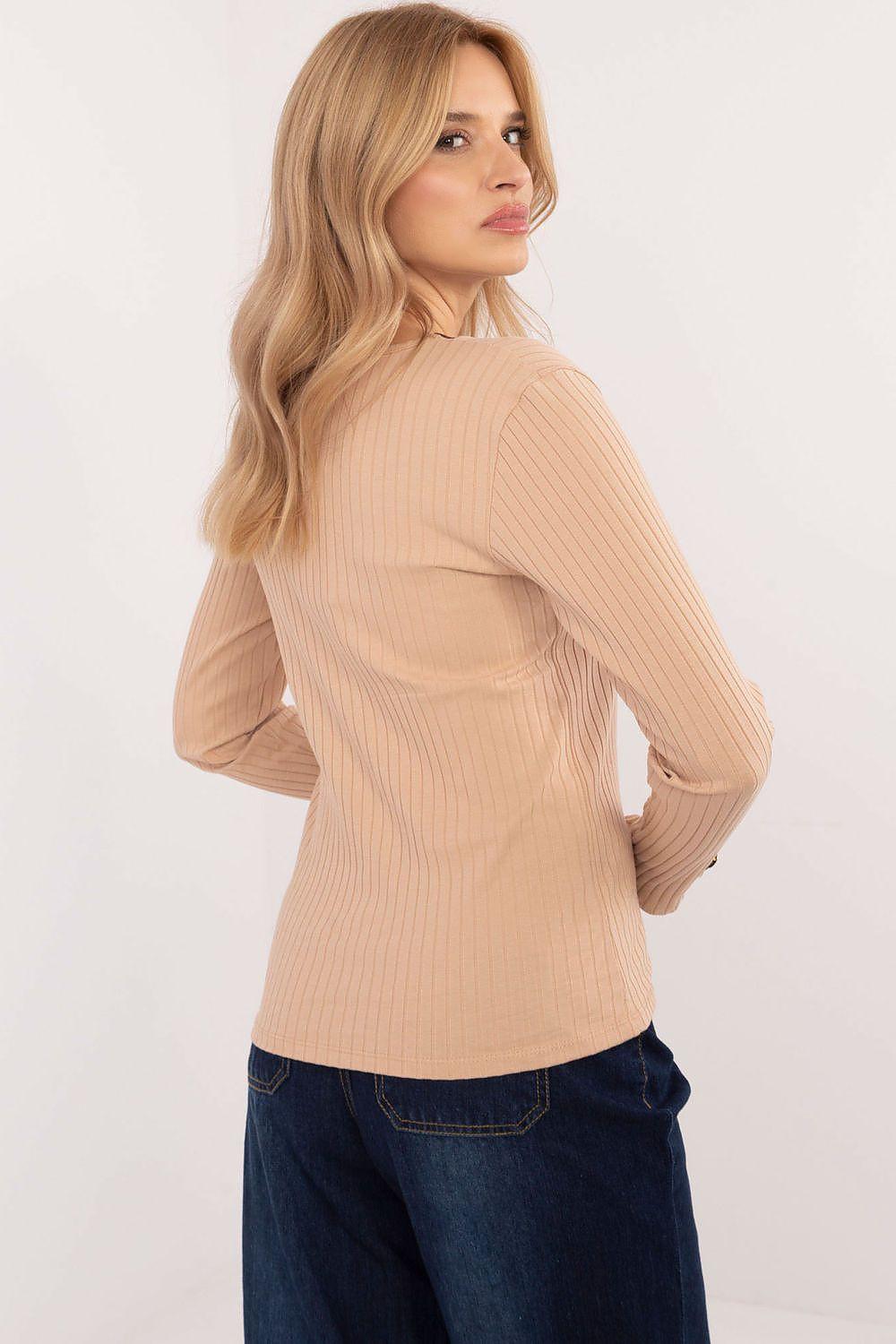 Light brown ribbed blouse with long sleeves and fitted waist