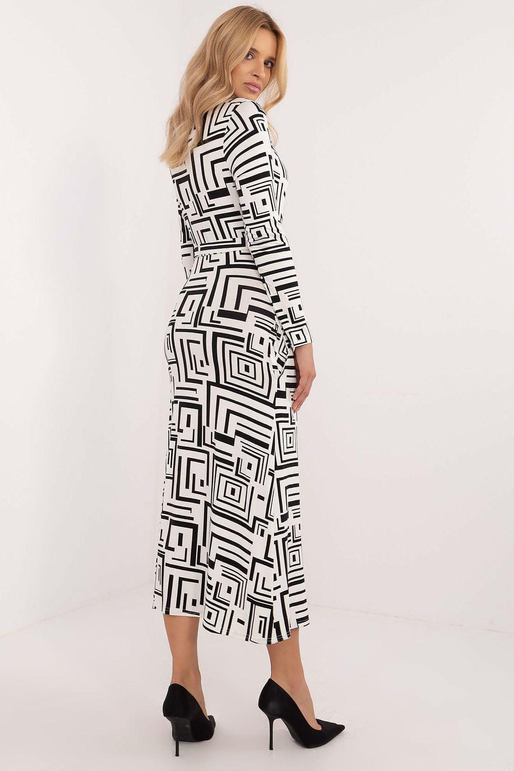 Geometric black-and-white daydress with long sleeves and fitted waist