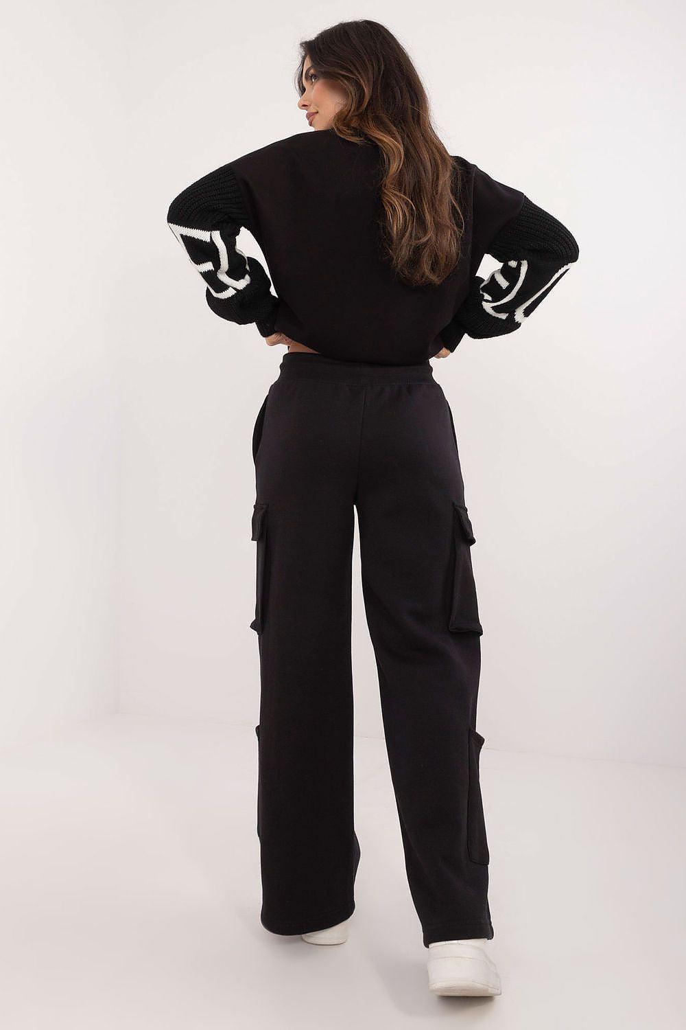 Black cargo track trousers with side pockets and relaxed straight leg fit