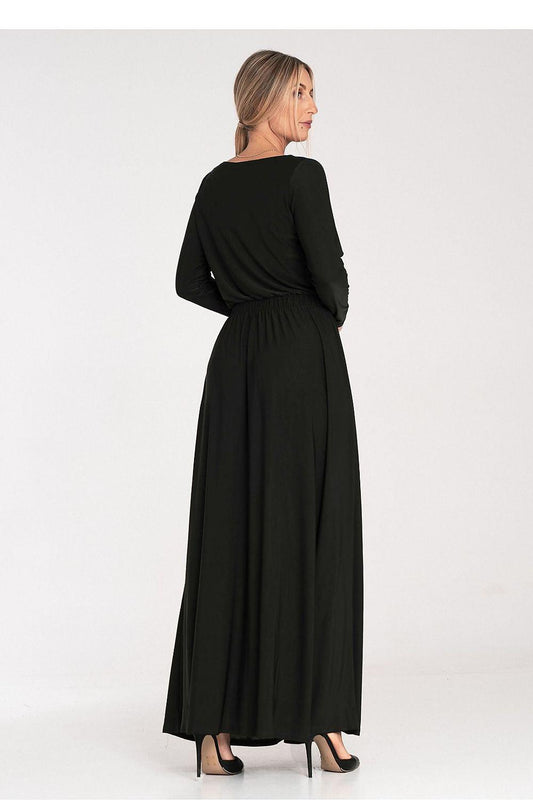 Black daydress back view with long sleeves, elastic waist, and full midi skirt.