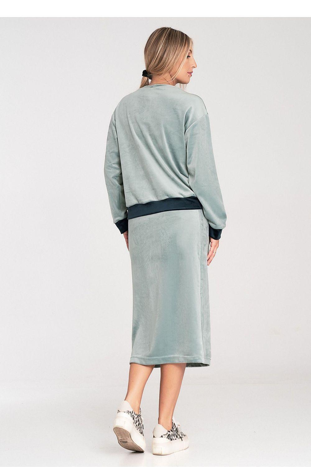 Light blue long-sleeve set with midi skirt, back view, dark waistband band.