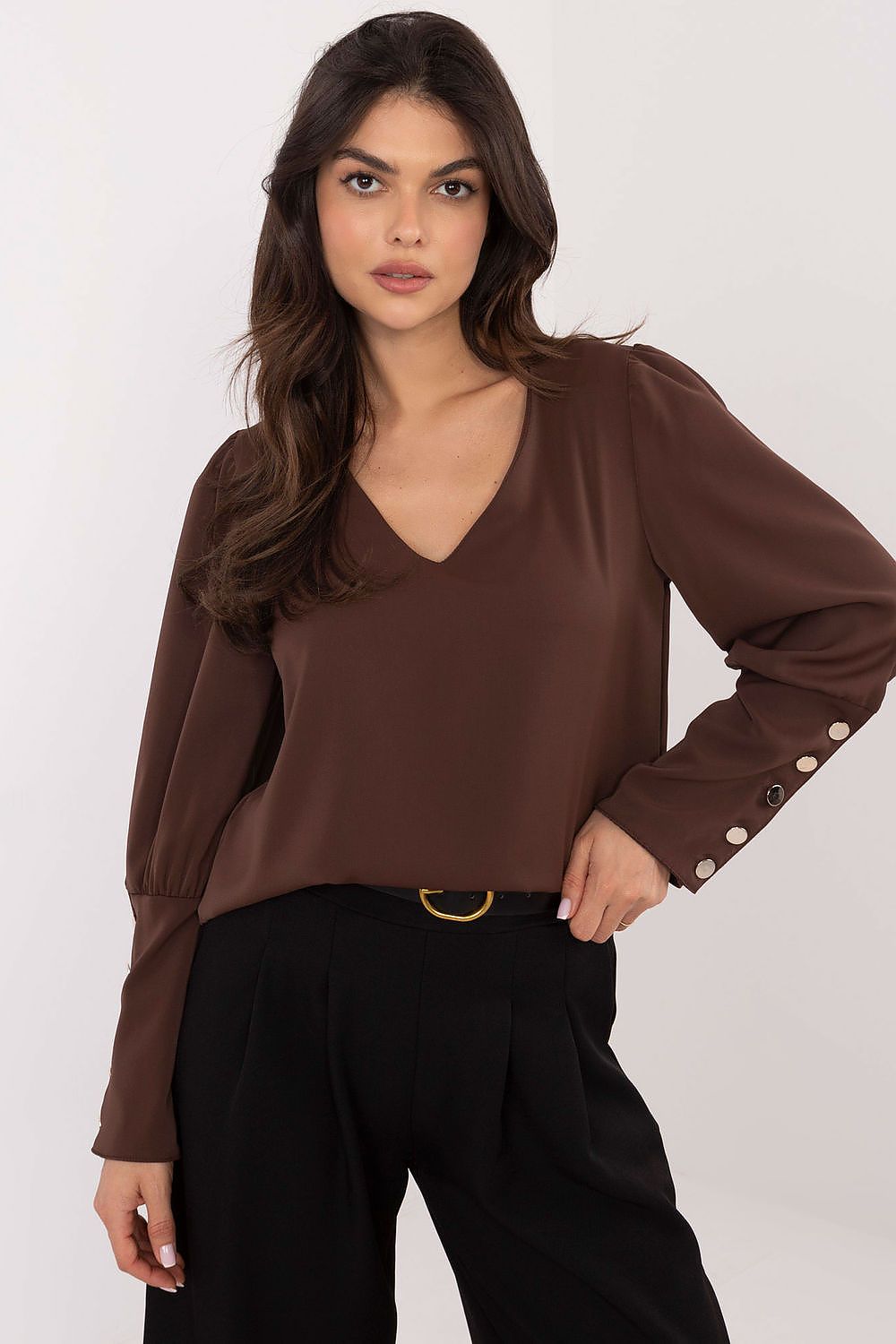 Brown V-neck blouse with puff sleeves and buttoned cuffs
