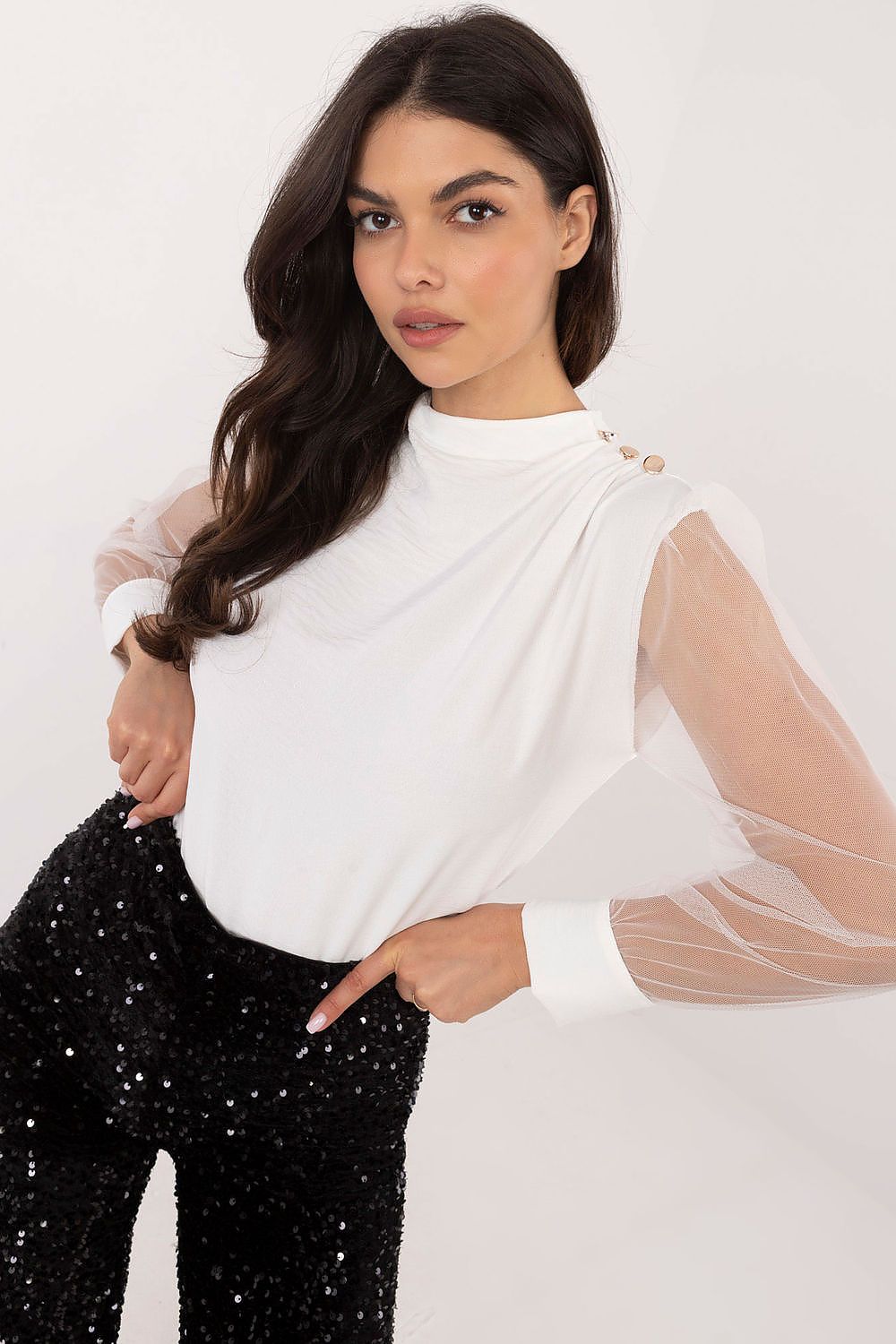 White blouse with mesh sleeves and small gold button detail