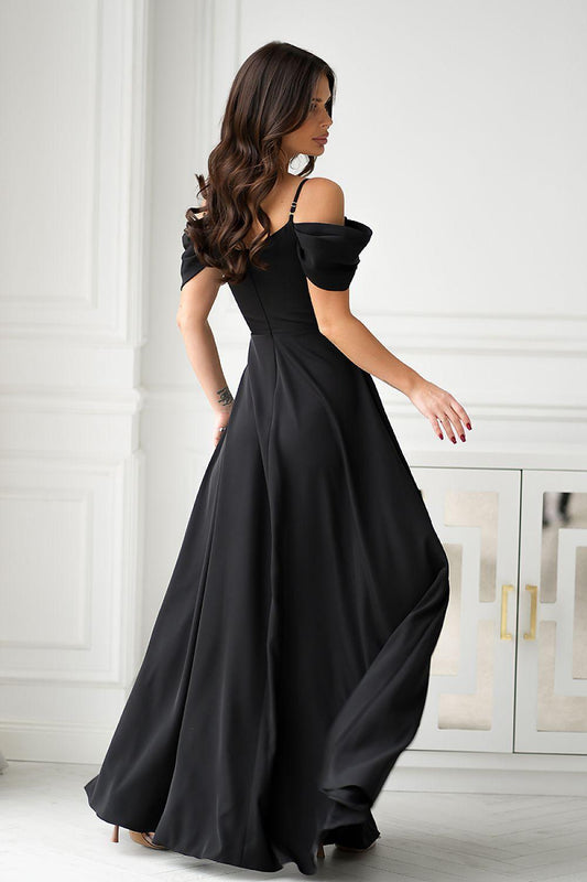 Black off-shoulder long dress with gathered neckline and wide flowing skirt