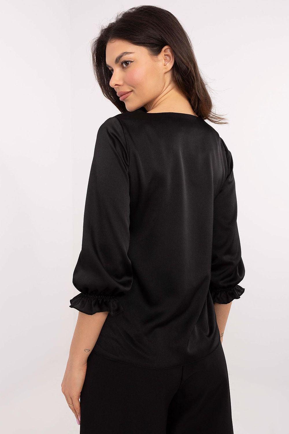 Black blouse back view with long sleeves and gathered cuff details