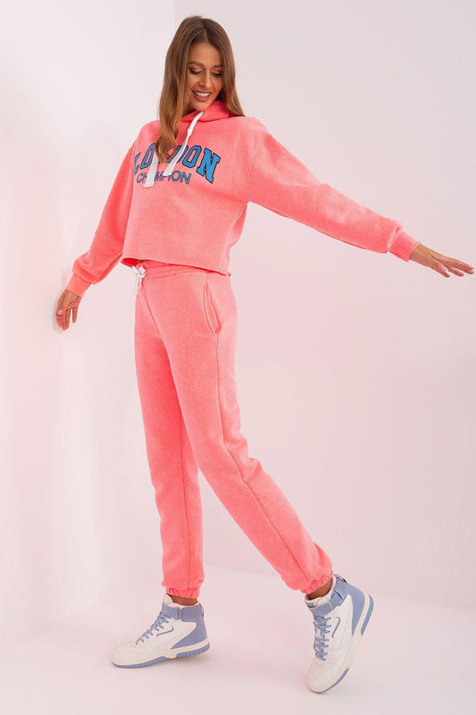 Pink sweatshirt and jogger set, hooded top with drawstring waist and relaxed jogger legs