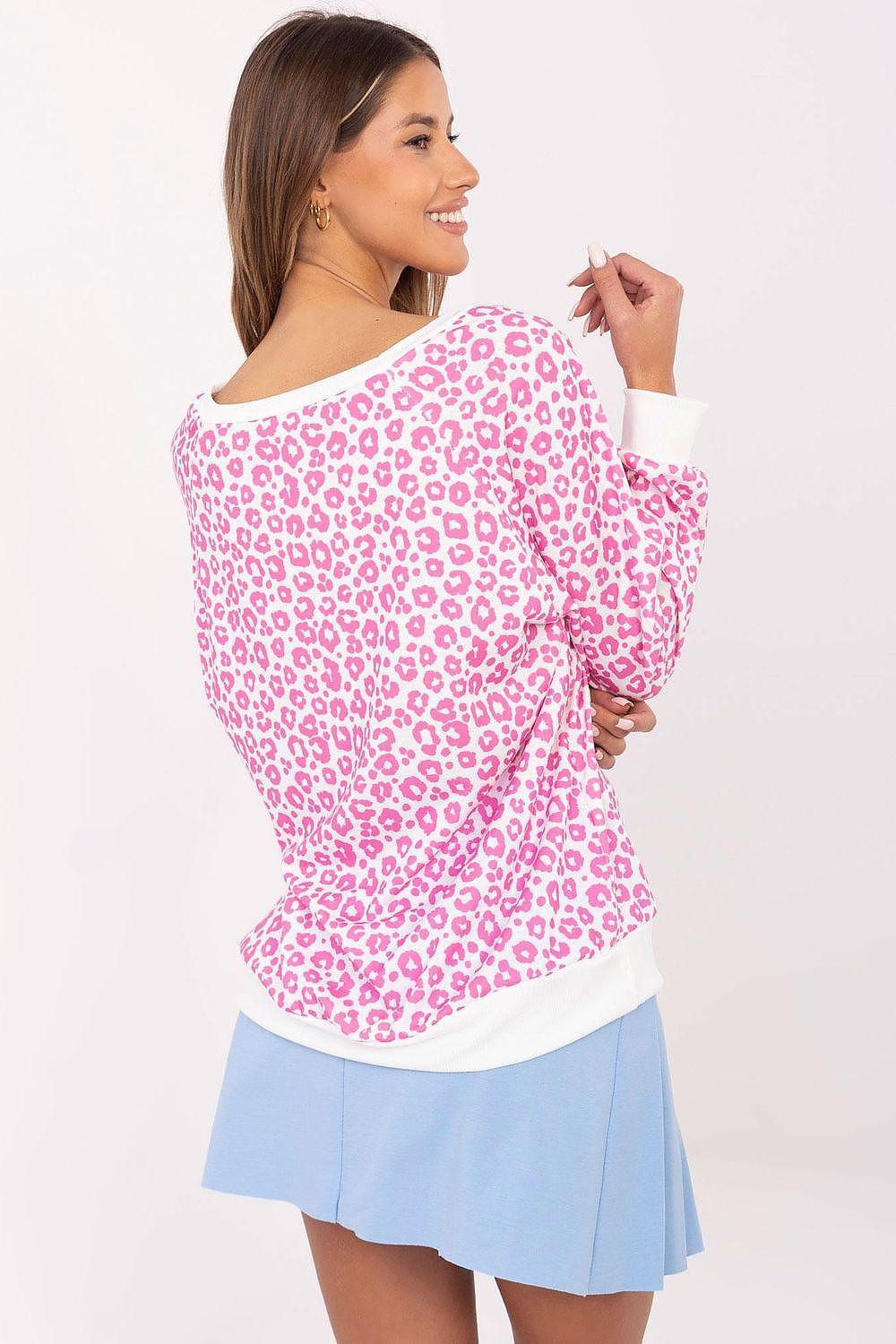 Pink leopard-print blouse with long sleeves and round neck, back/side view