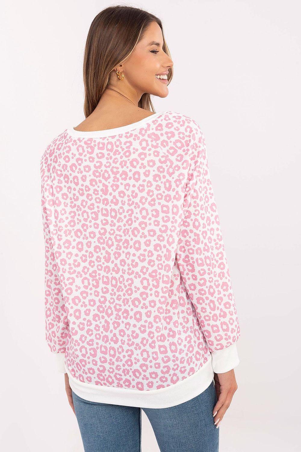 Pink animal print blouse back view with long sleeves and round neckline