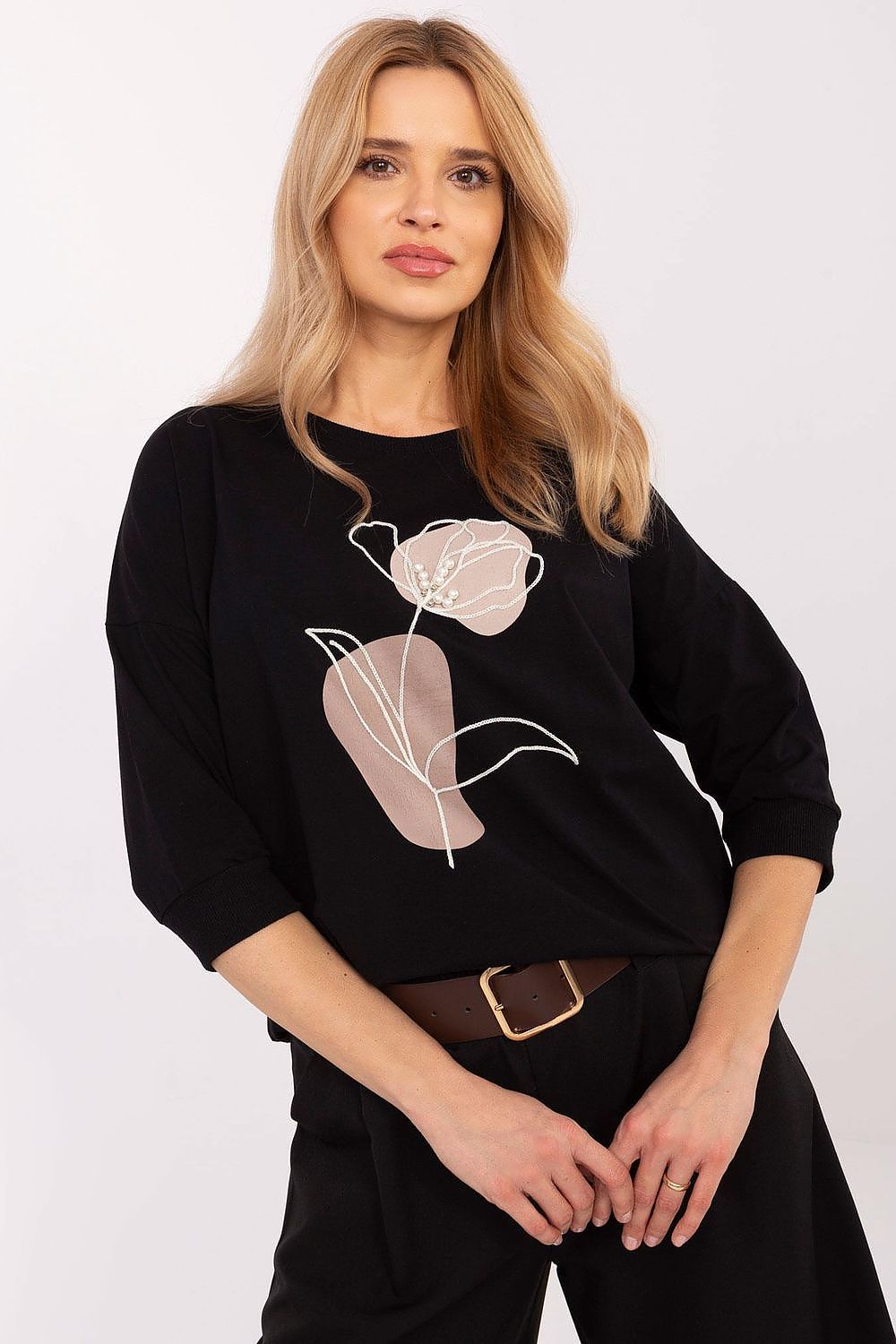 Black cotton blouse with embroidered floral design