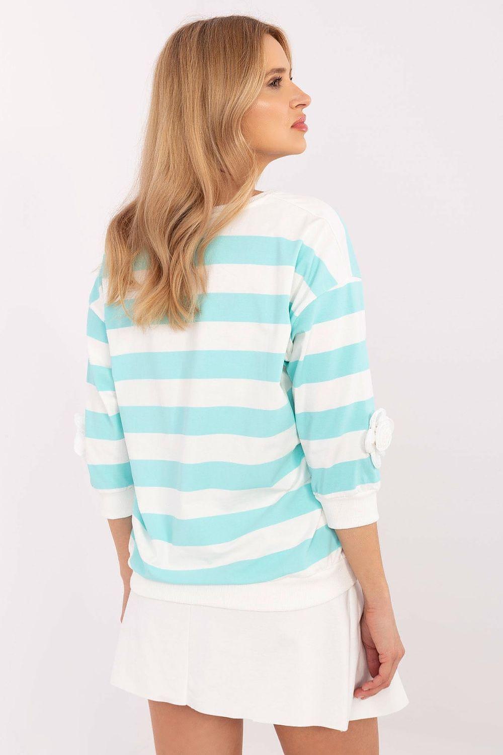 Striped blouse with crew neck and long sleeves, shown from the side/back