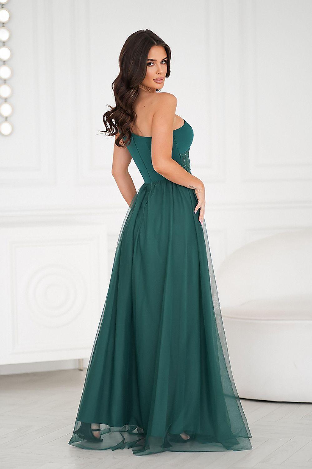 Green maxi dress with sequined bodice and flowing tulle skirt, sleeveless halter