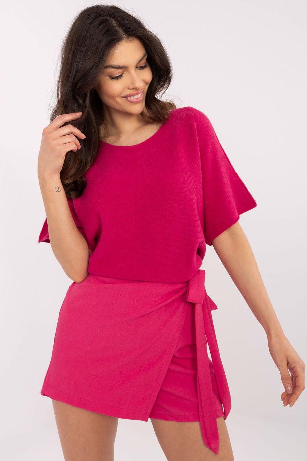 Pink high-waist skort with side tie sash and overlapping front panel