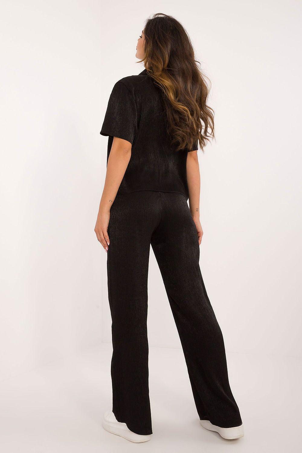 Two-piece outfit set in black: short-sleeve top and wide-leg trousers, back view