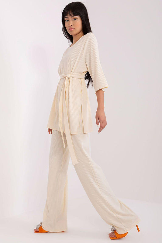 Beige ribbed knit matching set with tie waist top and wide-leg high-waist pants