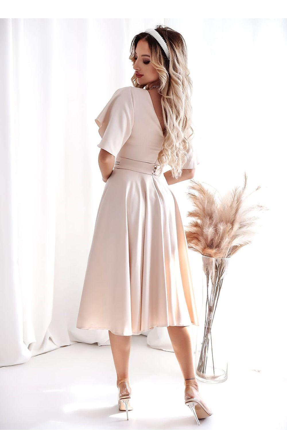 Ivory cocktail dress with short flutter sleeves, V-neck back, cinched waist and midi skirt