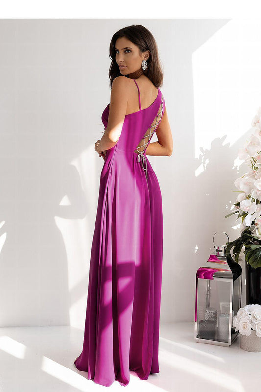 Fuchsia long backless-style dress with thin straps, gathered waist and front slit