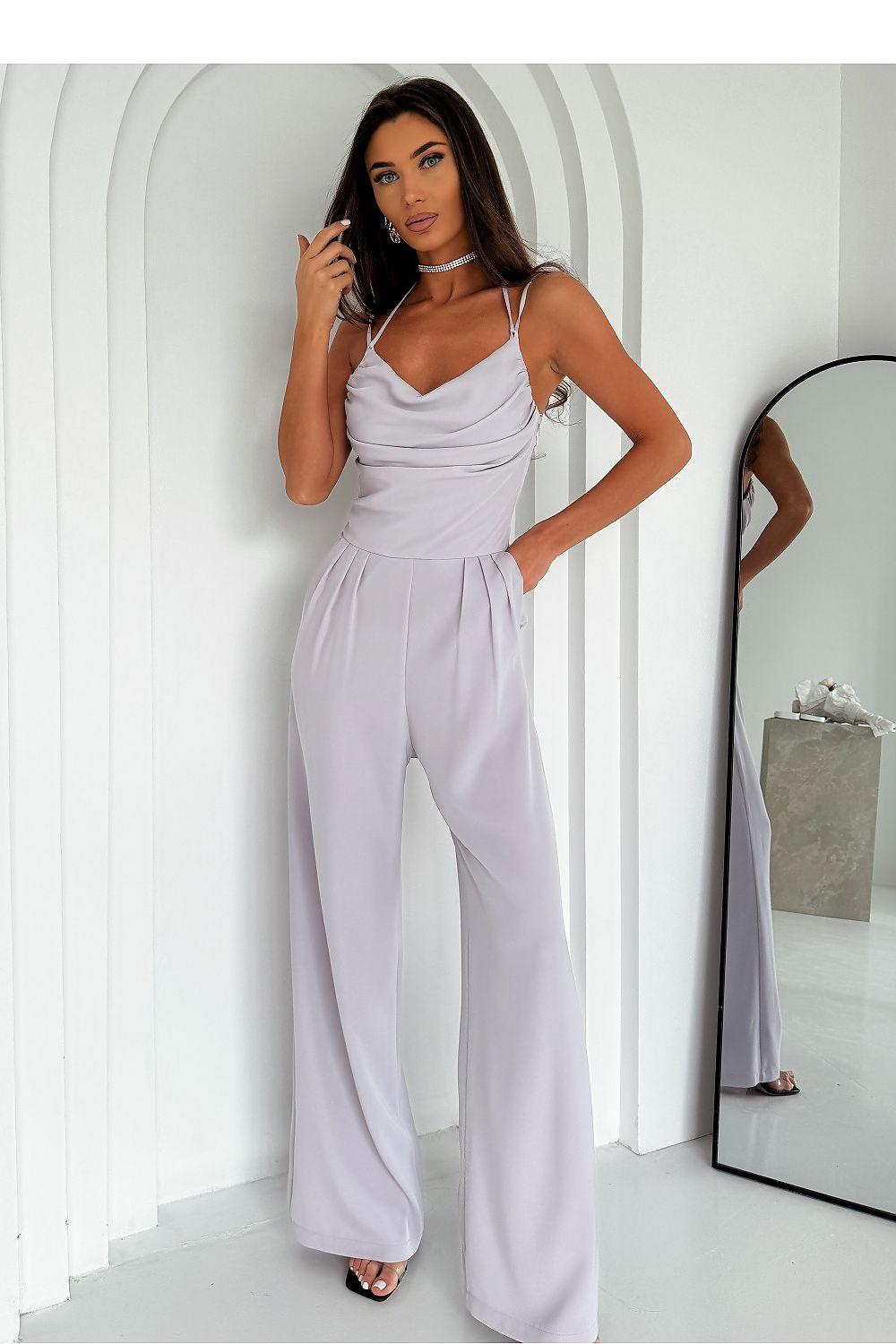 Light grey pleated jumpsuit with V-neck and spaghetti straps, wide-leg draped waist