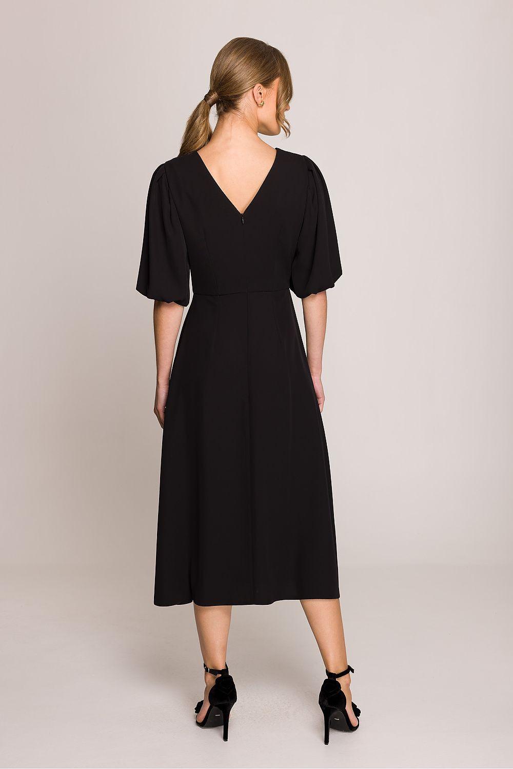Black midi daydress with V-back and short puff sleeves, fitted waist with A-line skirt.