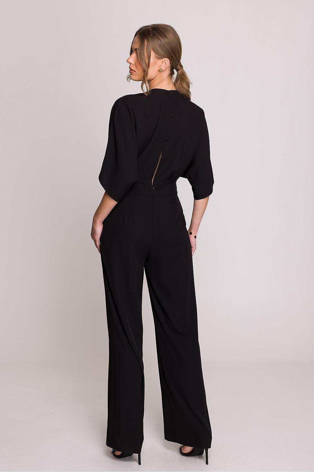 Black back-tie jumpsuit with wide-leg pants and three-quarter kimono sleeves