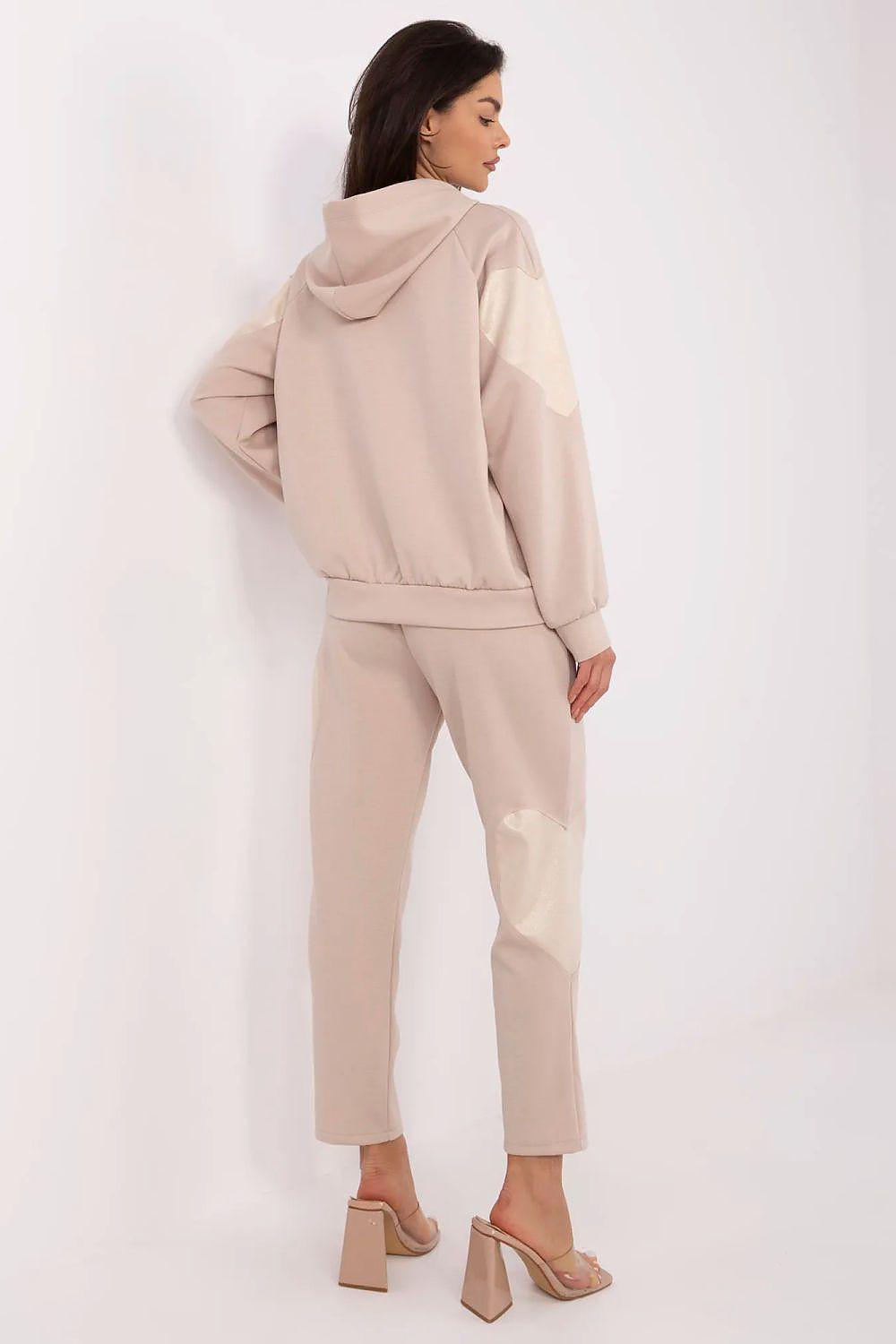 Light beige hoodie and slim jogger pants set with hood and lighter panel details