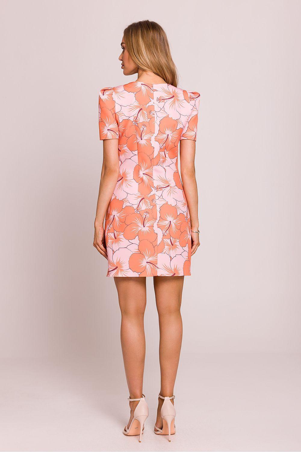 Back view of peach and pink floral daydress with puff short sleeves