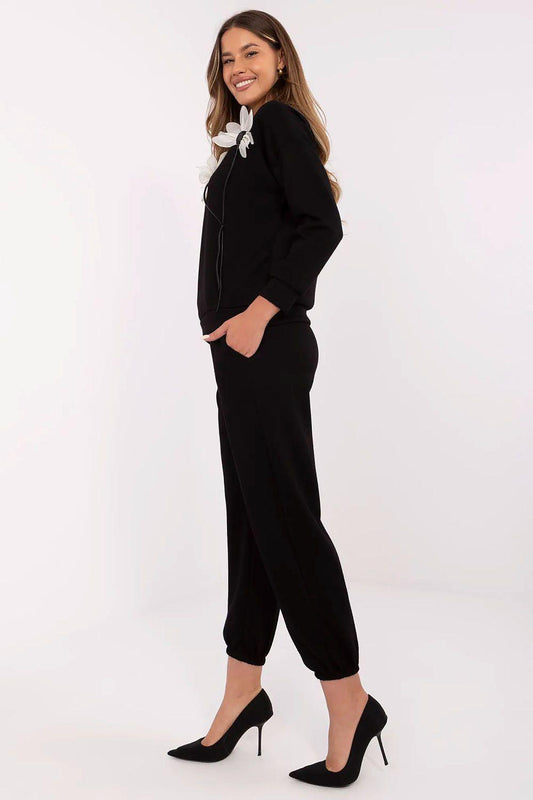 Women’s floral-applique black loungewear set: side view of sweatshirt and jogger pants