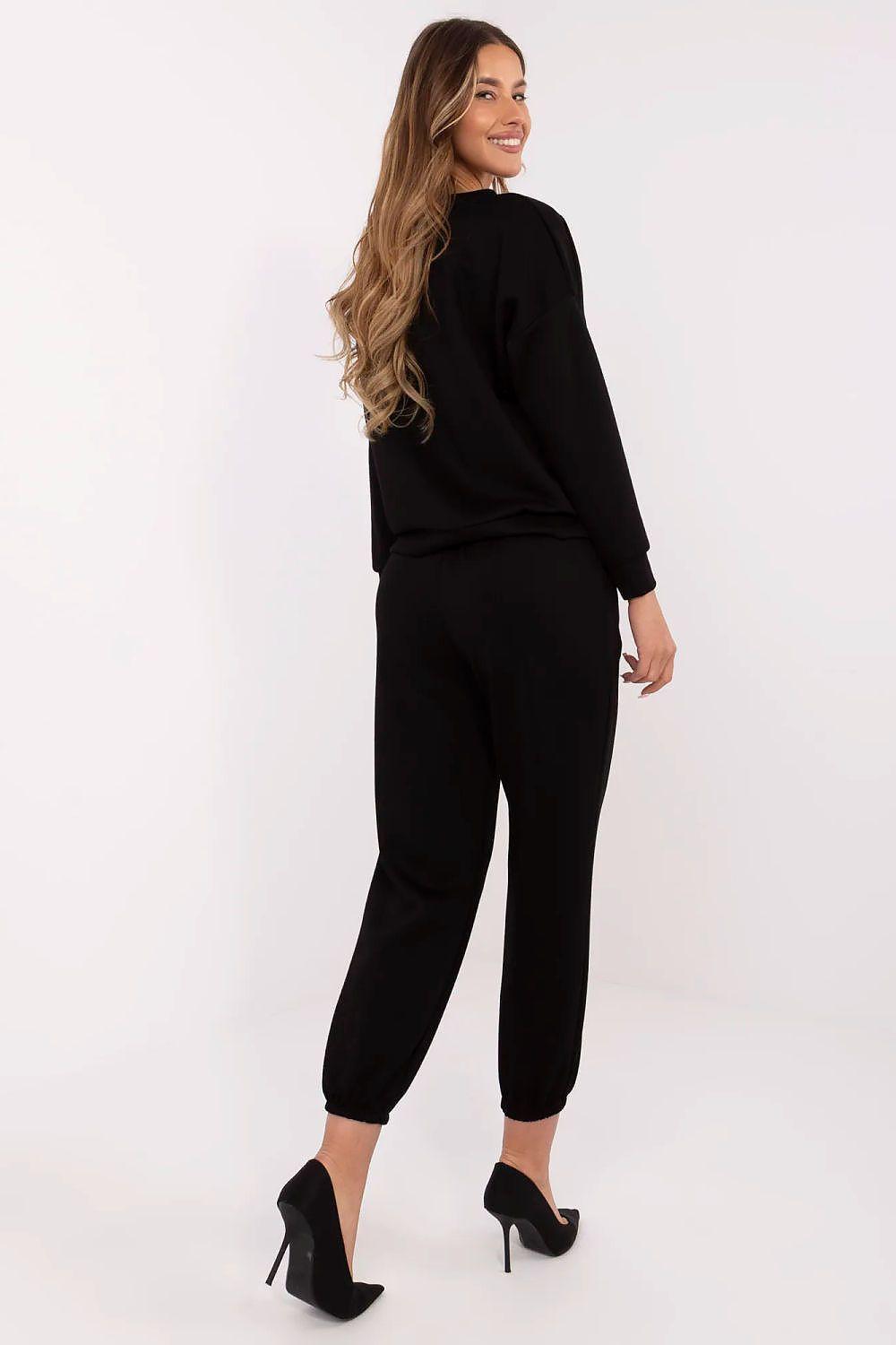 Women’s floral-applique black loungewear set: joggers and crewneck sweatshirt, angled view