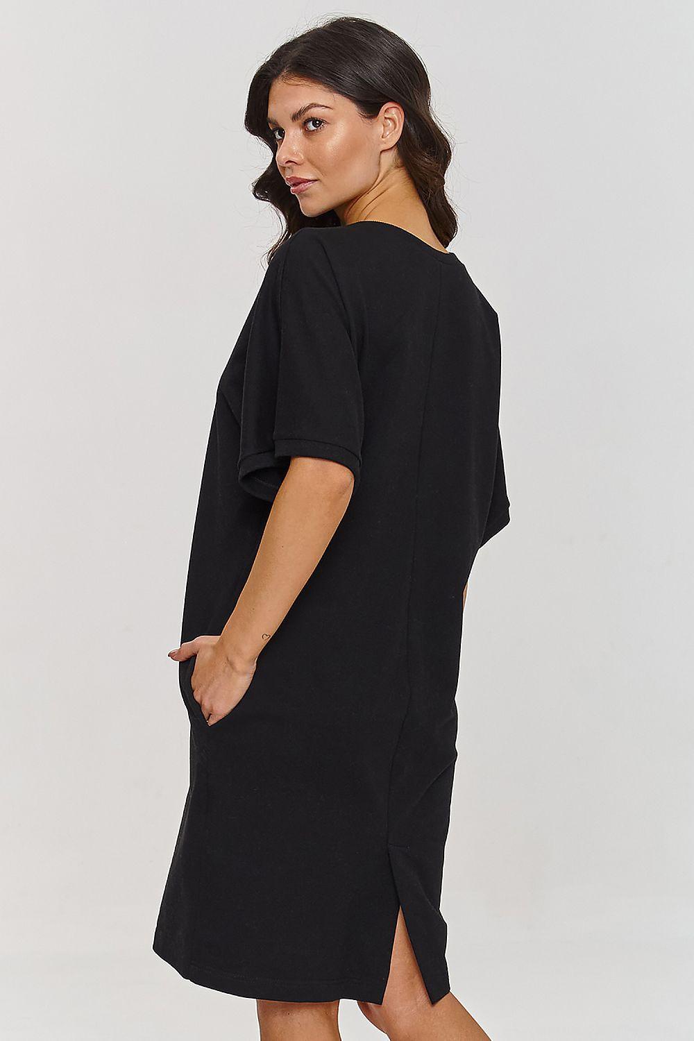 Makadamia daydress in black, back view, short sleeves and midi hem slit