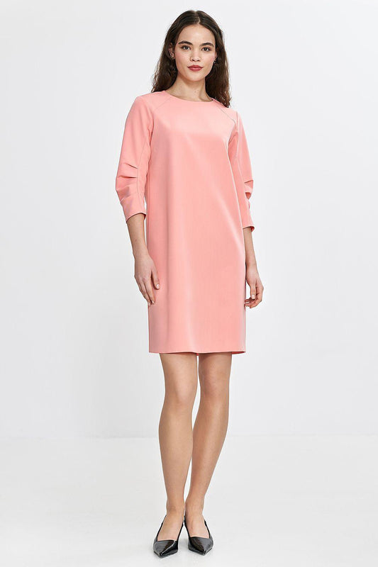 Pink day dress with long 3/4 sleeves and straight fit above the knee