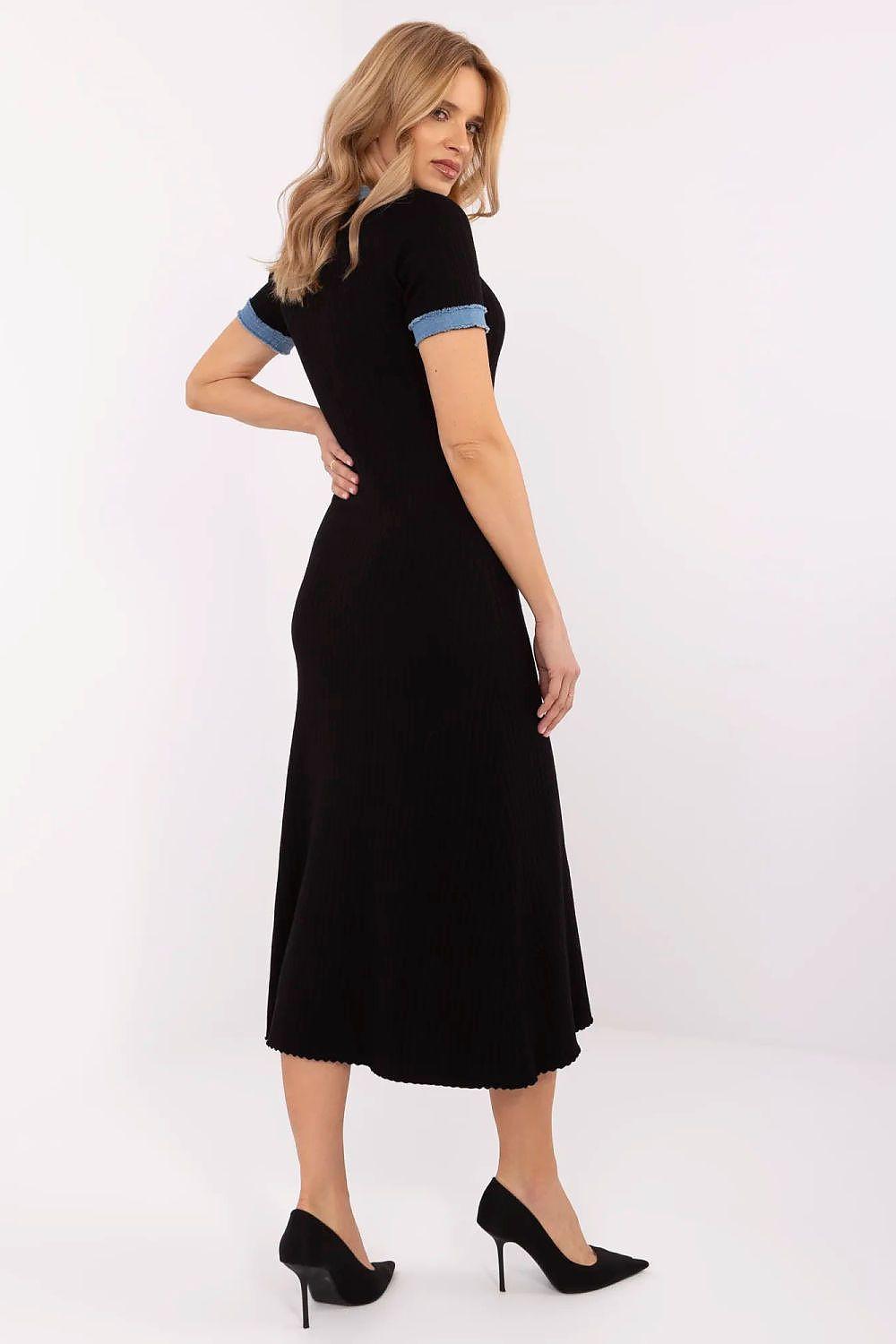 Black daydress with blue neckline trim, short sleeves, and A-line midi skirt