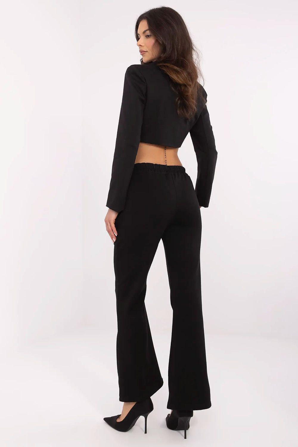 Black wide-leg tracksuit trousers with elastic waist and straight flared legs