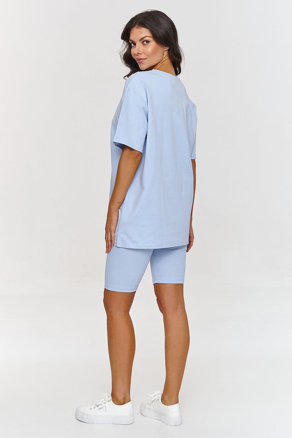 Light blue short-sleeve tunic and biker shorts set from side view, crew neck