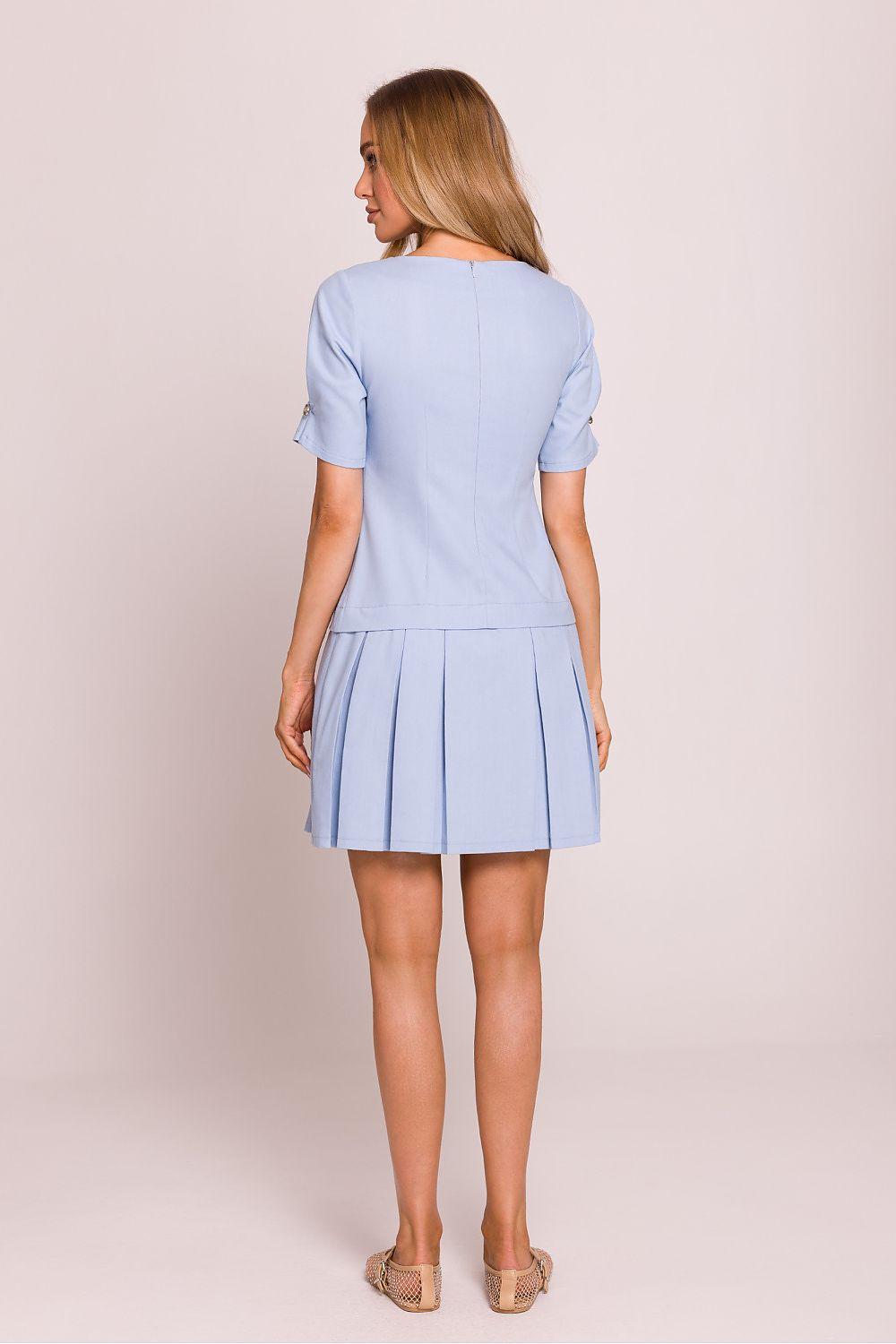 Light blue daydress, back view, short sleeves and pleated hem skirt