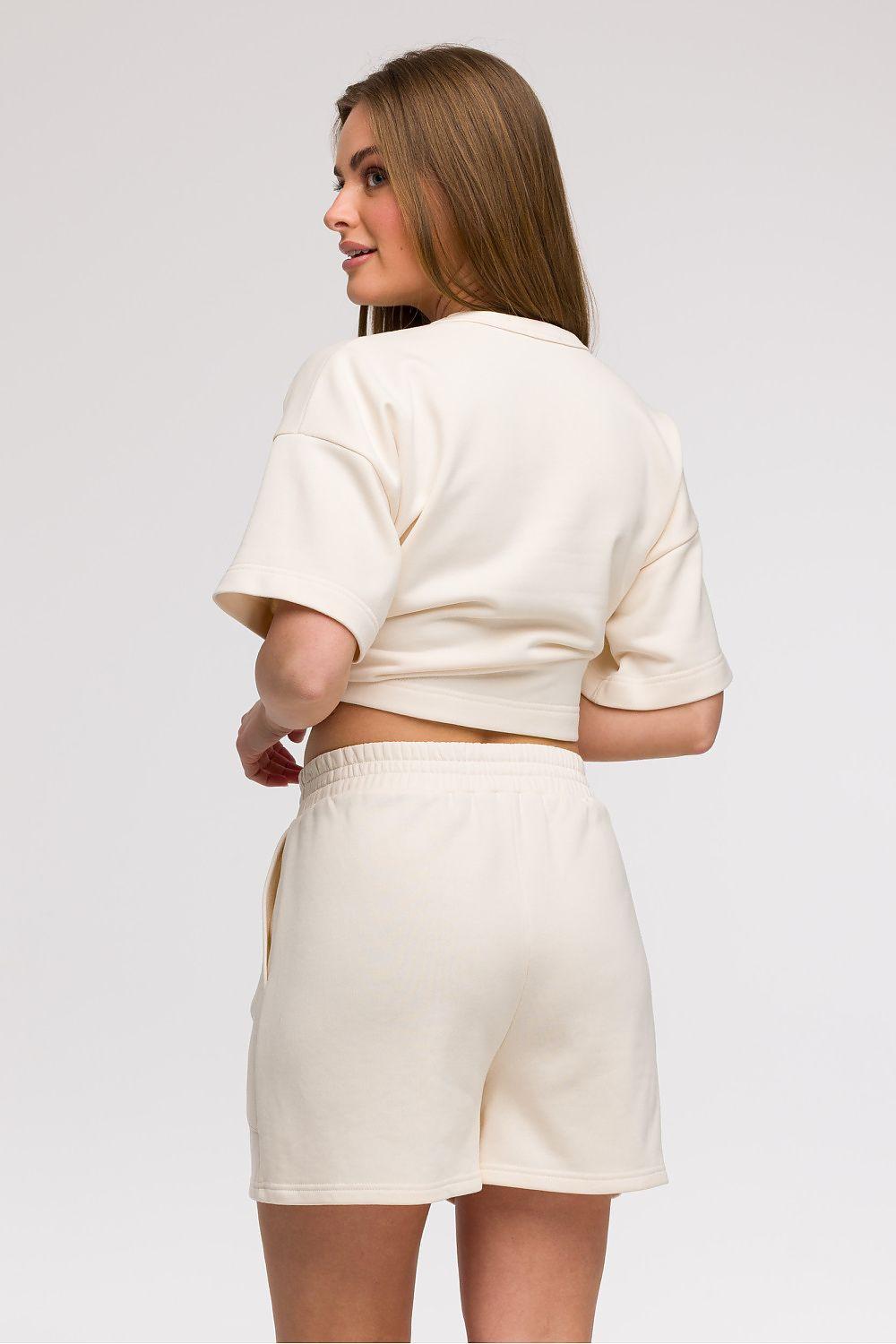 Cream women’s shorts, back view, elastic waistband with drawstring