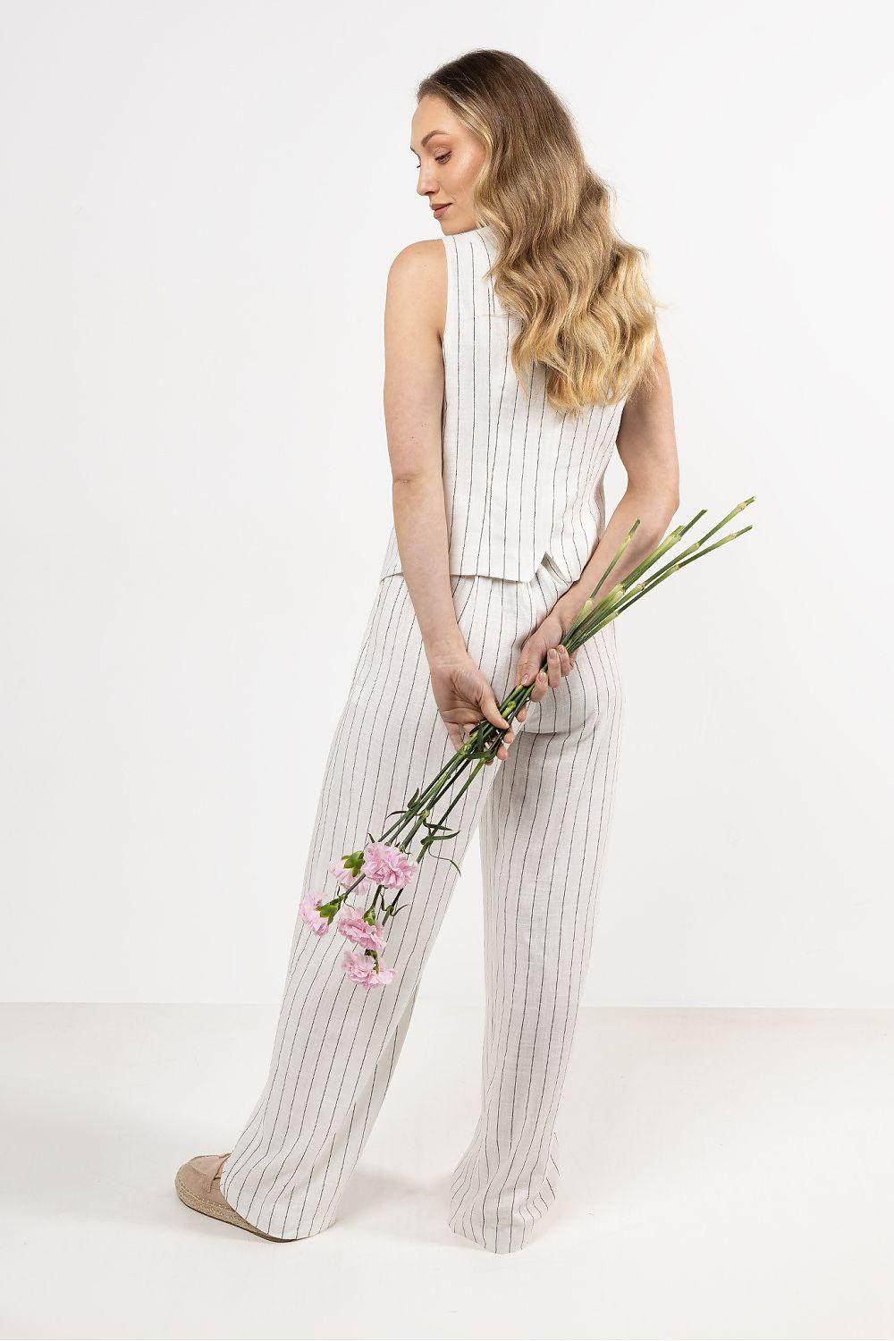 Beige pinstriped wide-leg trousers, side view with draped wide fit