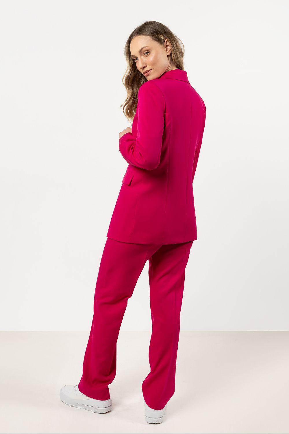 Women's magenta trousers with straight legs, side view.