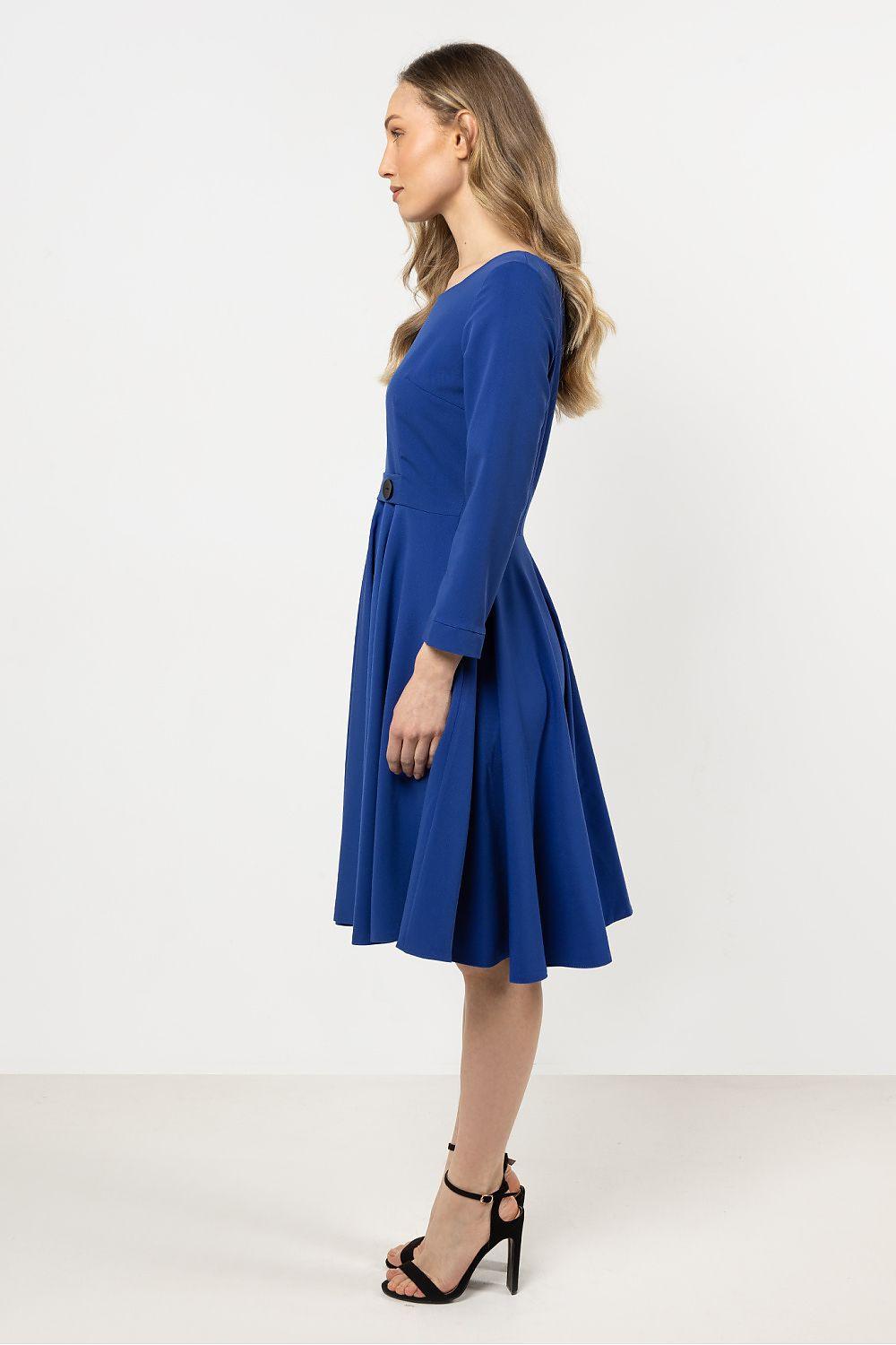Awama daydress in blue, side view, waist buttons and pleated skirt