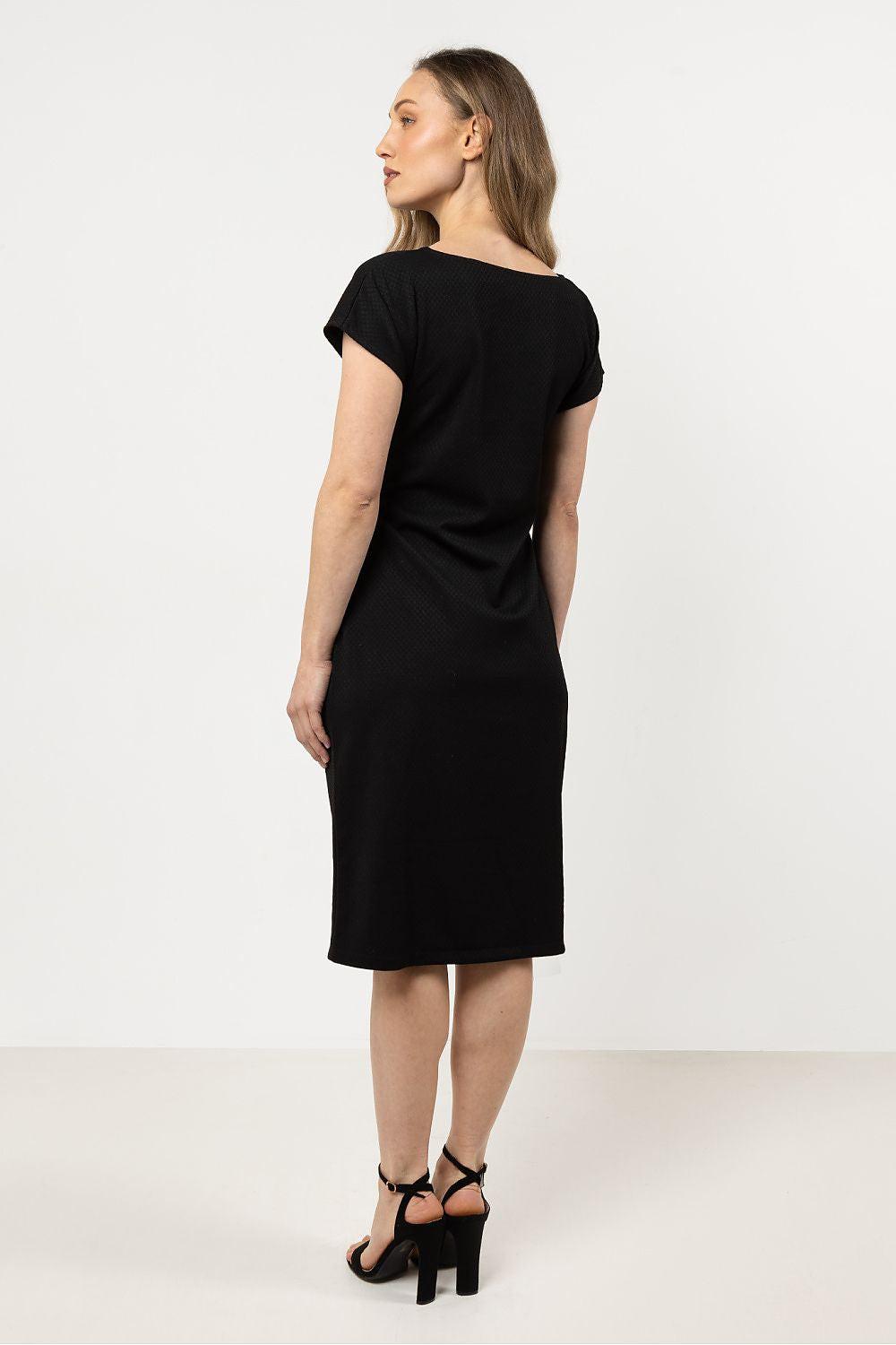 Black Awama daydress back view with short sleeves and straight knee-length cut