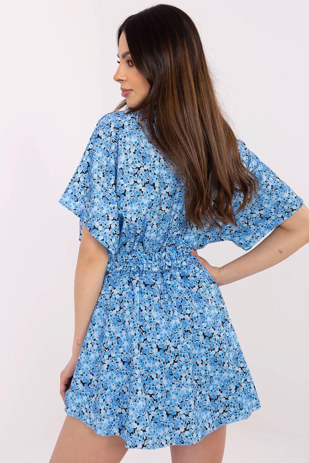 Blue speckle mini dress with short sleeves and gathered waist, side profile