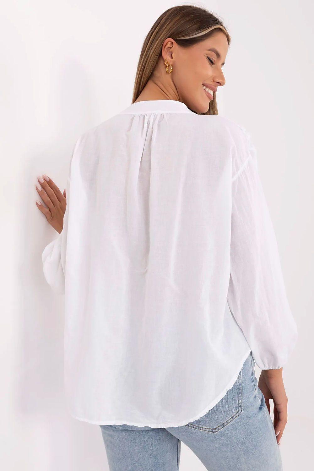 White blouse back view with long puff sleeves and loose gathered design