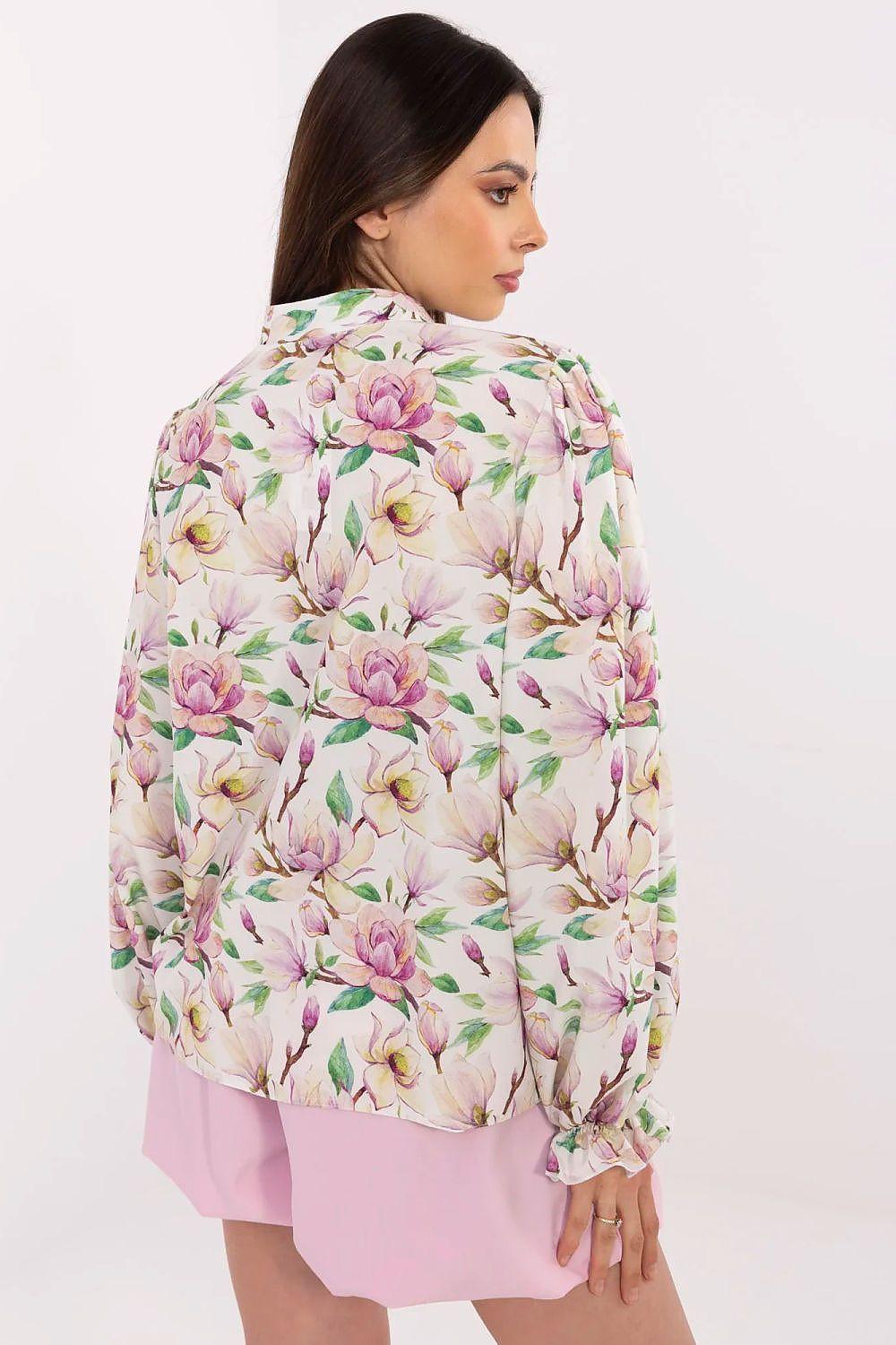 Long-sleeve shirt with light cream base and multi-color floral print, button front