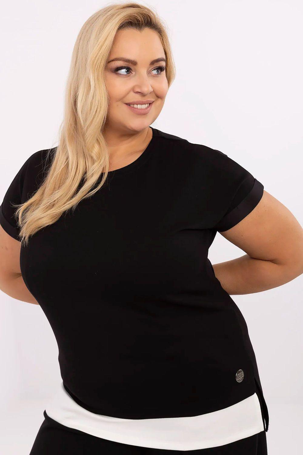 Plus size blouse in black, crew neck, short sleeves, angled view with white hem band