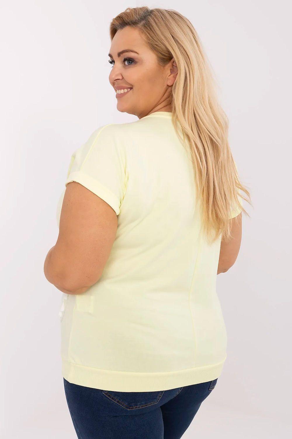 Plus size blouse in pale yellow with short sleeves, plain back view