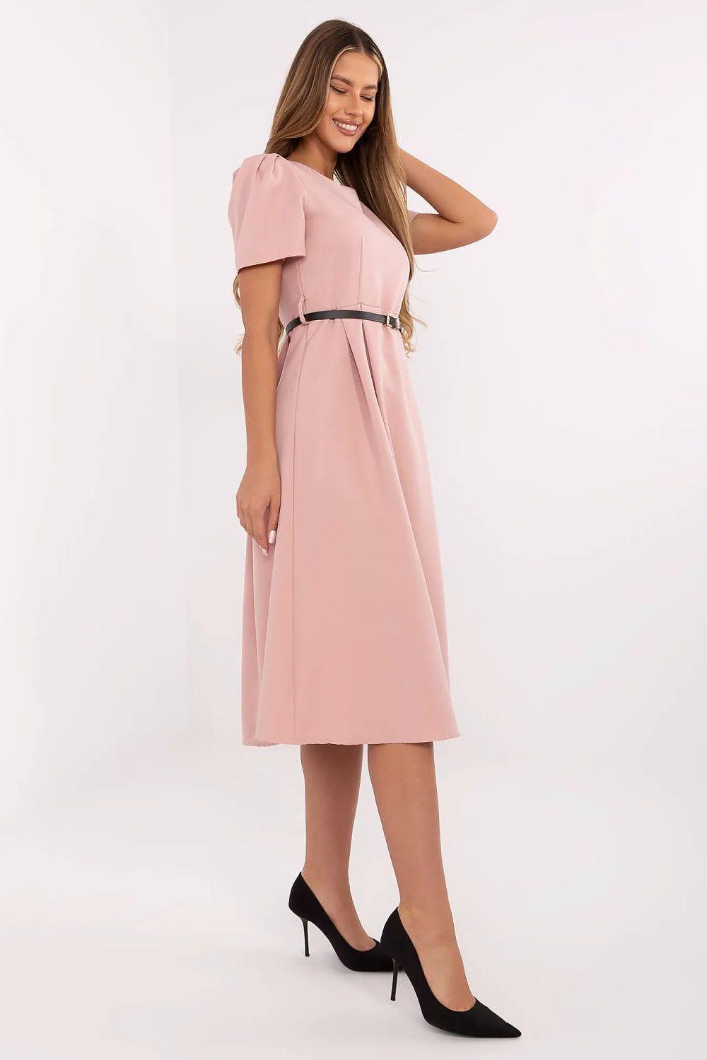 Pink daydress with short sleeves and waist belt, side view
