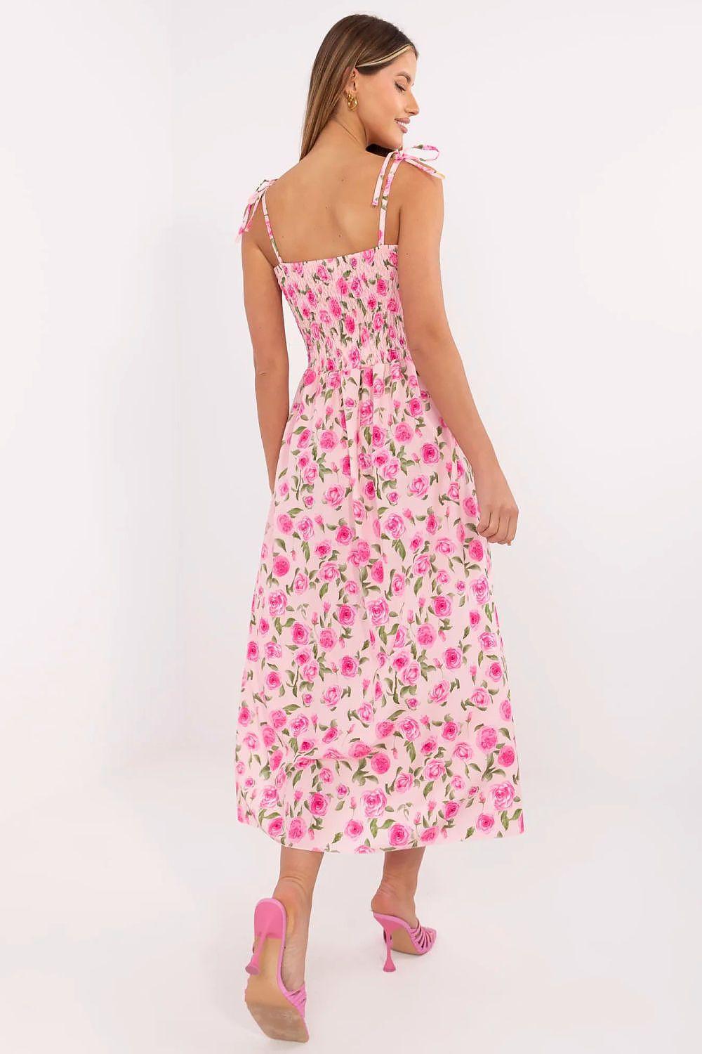Floral daydress back view with thin adjustable straps, pink and green rose print, midi
