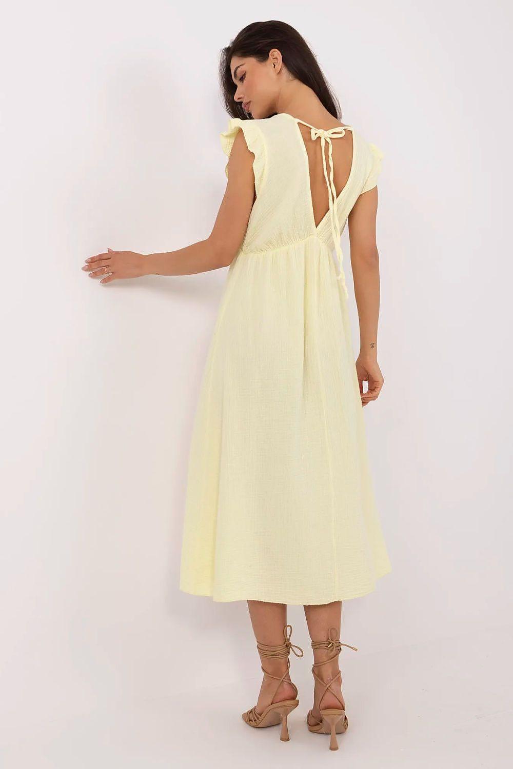 Yellow cotton daydress open back tie strap detail V-neck flared midi skirt